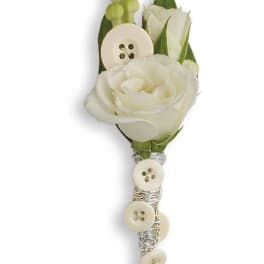 White rose boutonniere with buttons and silver wrap