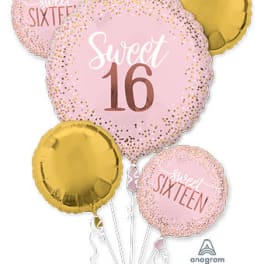 Pink and gold Sweet 16 balloons with confetti dots