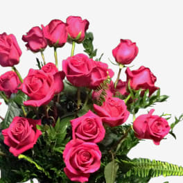 Bouquet of bright pink roses with greenery