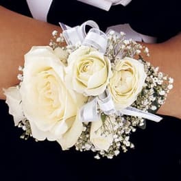 White rose wrist corsage with baby's breath and ribbon