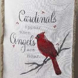 Decorative pillow with a red cardinal and the words "Cardinals are Angels"