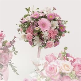 Pink and white mixed flower bouquet with roses and daisies