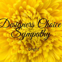 Yellow chrysanthemum with "Designers Choice Sympathy" text overlay