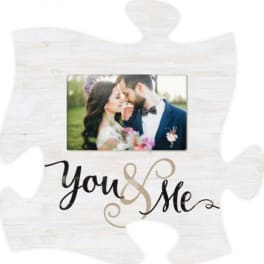 White decorative photo frame with "You & Me" text and a couple's picture