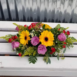 Bouquet of yellow gerbera daisies and pink roses