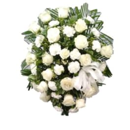 White rose and carnation bouquet with a white ribbon