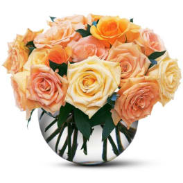Bouquet of peach and yellow roses in a round glass vase