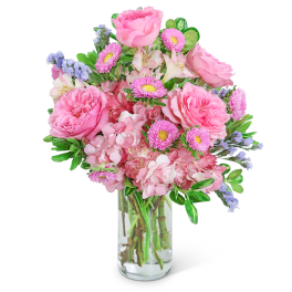 Pink mixed bouquet in a clear glass vase