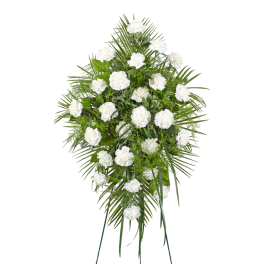 Standing spray of white carnations with green foliage