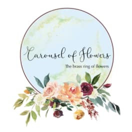 Circular floral logo with roses and greenery around the bottom