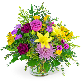 Colorful mixed bouquet in a clear glass vase