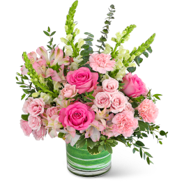 Pink roses and carnations in a green striped vase