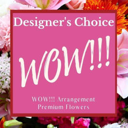 Designer’s choice flower arrangement with pink, white, and orange blooms