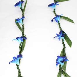 Blue flower lei with green leaves on a white background