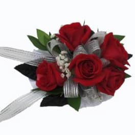 Red rose bouquet with silver ribbon and greenery