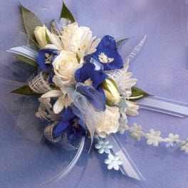 Blue and white bridal bouquet with ribbon accents