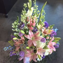 Tall mixed bouquet with pink lilies and purple flowers