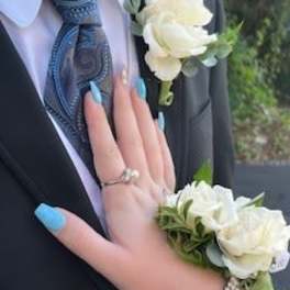 Neutral wrist corsage and boutonniere