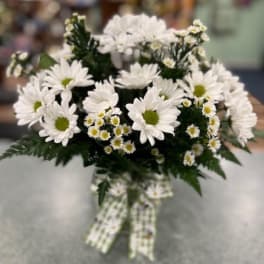 White daisy bouquet with a checkered ribbon