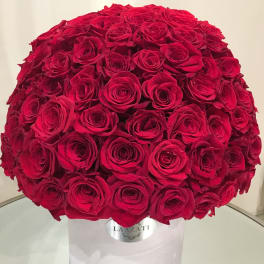Large dome bouquet of red roses in a white box