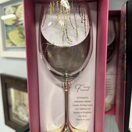Decorative wine glass in a pink gift box with gold lettering
