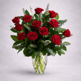 Bouquet of red roses in a clear glass vase