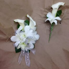 White calla lily corsage and boutonniere with silver ribbon