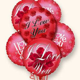 Cluster of red heart-shaped balloons with love messages