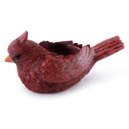 Red bird-shaped decorative planter with an open top