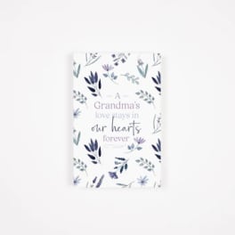 Decorative card with floral leaves and the text 'A Grandma's love stays in our hearts forever'