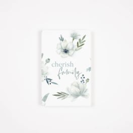 Floral card with the words "cherish family" and pale watercolor flowers