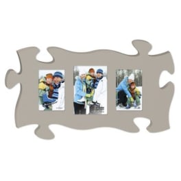 Puzzle-piece photo frame with three winter family pictures