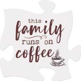 Puzzle-piece sign reading "this family runs on coffee" with a cup graphic