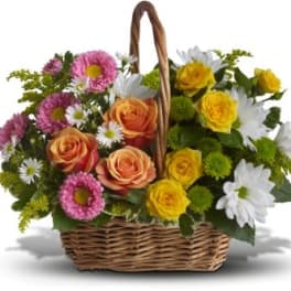 Mixed flower basket with roses, daisies, and chrysanthemums