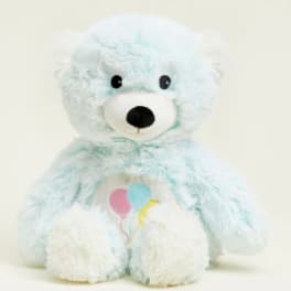 Light blue teddy bear plush with a balloon graphic on its chest
