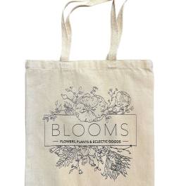 Canvas tote bag with floral line art and the word BLOOMS