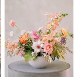 Pastel floral arrangement in a white bowl vase
