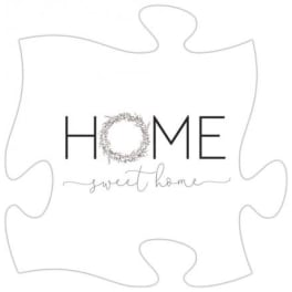 White puzzle-piece sign with the words HOME sweet home