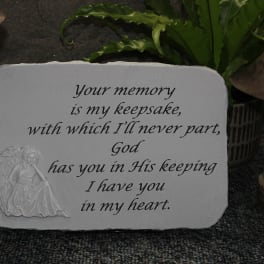 Memorial plaque with an angel and a sympathy verse