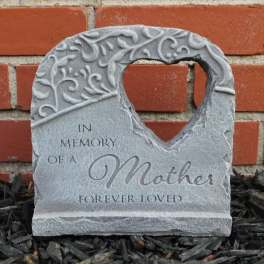Gray memorial stone with the words "In Memory of a Mother"