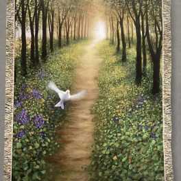 Fringed wall tapestry showing a forest path with a white dove
