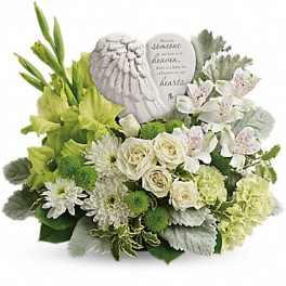 White and green sympathy bouquet with a memorial stone