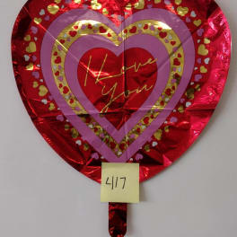 Heart-shaped red foil balloon with "Love You" text