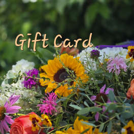 Mixed bouquet with sunflowers, roses, and daisies