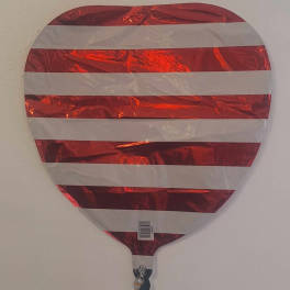 Red and white striped heart-shaped foil balloon