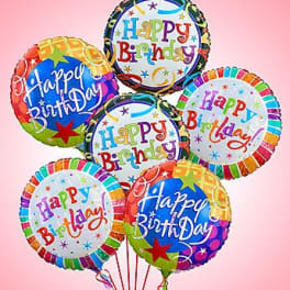 Cluster of colorful birthday balloons with "Happy Birthday" text