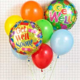 Cluster of colorful balloons, including two printed foil balloons