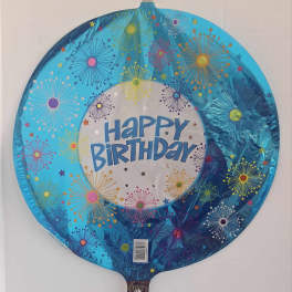Round blue birthday balloon with colorful starburst patterns