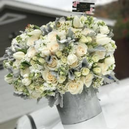 White rose and tulip bouquet in a silver box