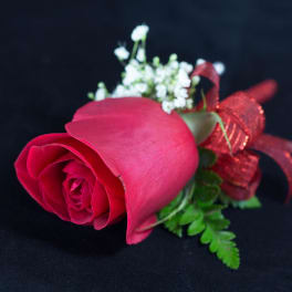 Single red rose boutonniere with baby's breath and ribbon